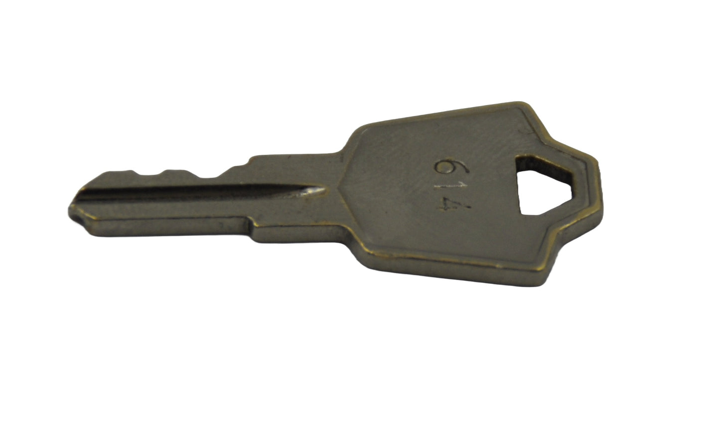 Side view of A metal 614 replacement key with a key code labeled on it, typically used for electric switches and control panels. On a white background