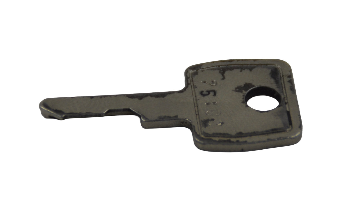 Top side view of A black metal key with the number 75122 inscribed on it, compatible with 75 Series locks. On a white background.