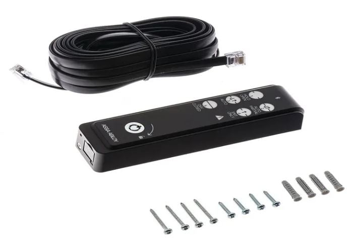 Assa Abloy - OMS Standard BLE with key consisting on a cat 5 cable, fixings and a rectangular panel, on a white background.