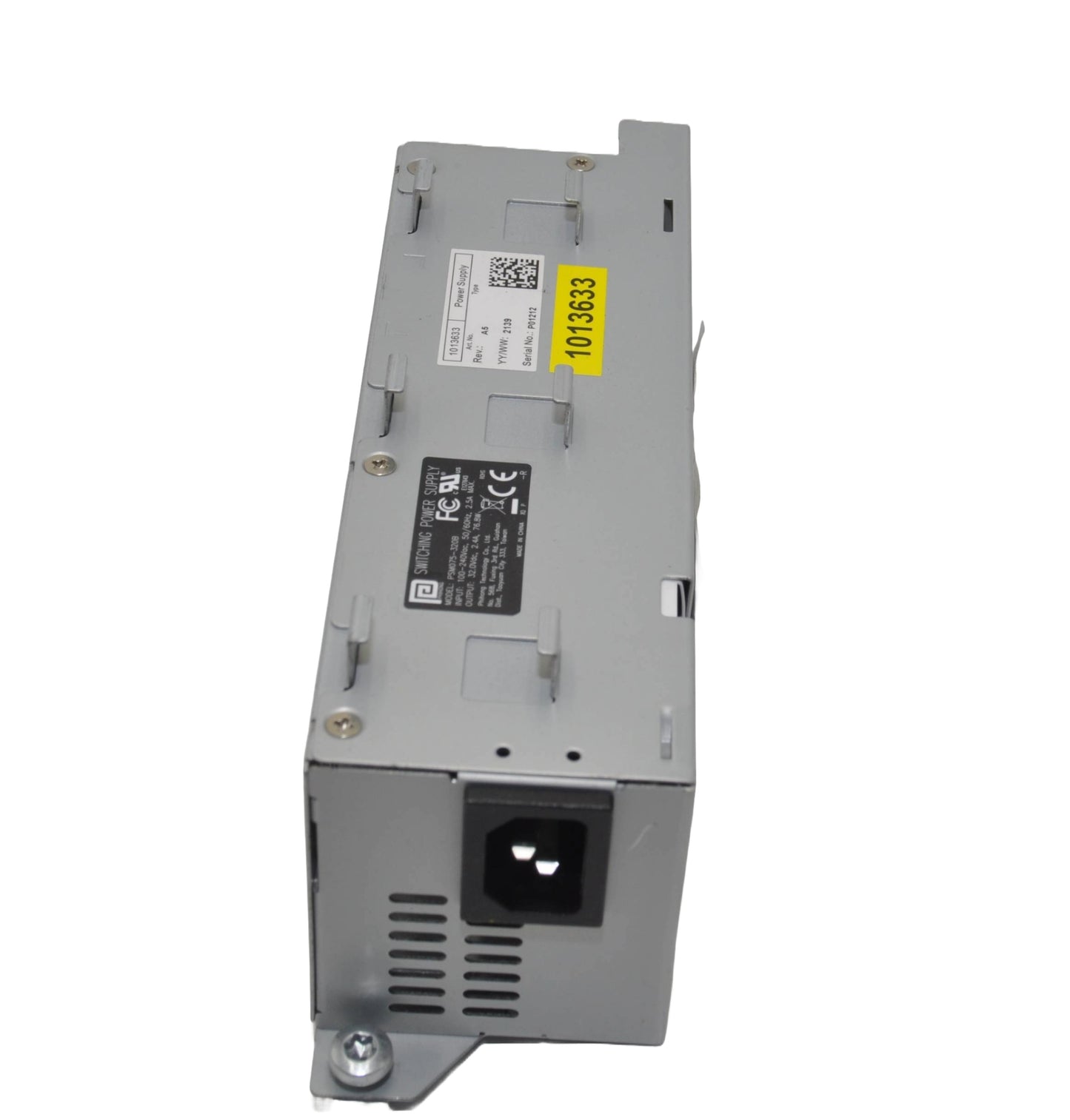 Power supply unit showing labels and socket on a white background.