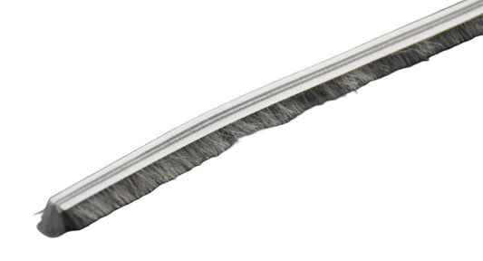 A close up view of a Draught excluder brush with bristles on a white background.