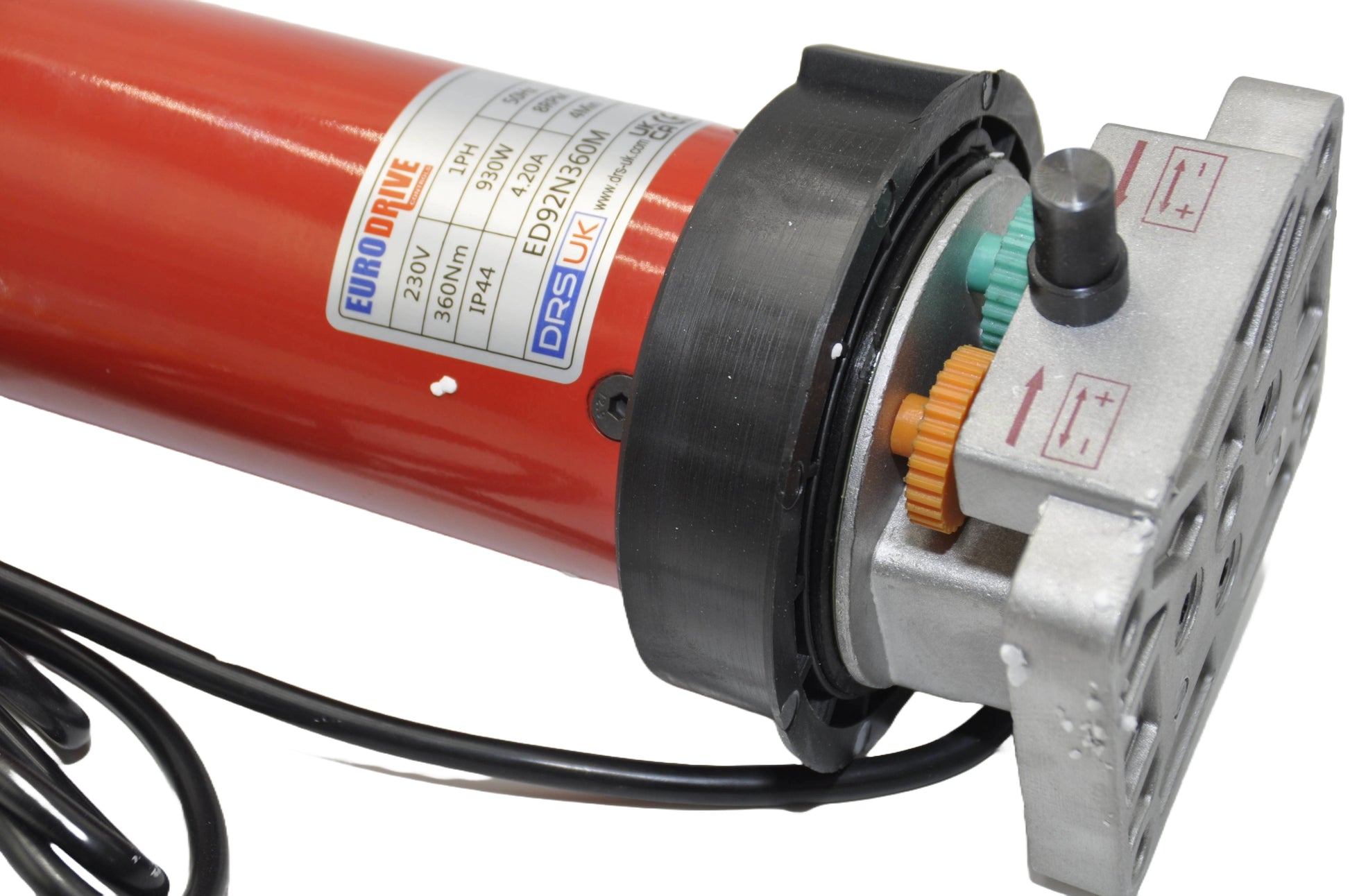 Electric motor with red casing and wiring on a white background