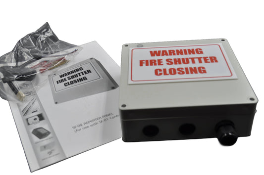 Fire shutter control box with white label with "warning fire shutter closing"in red with manual and packaging on a white background