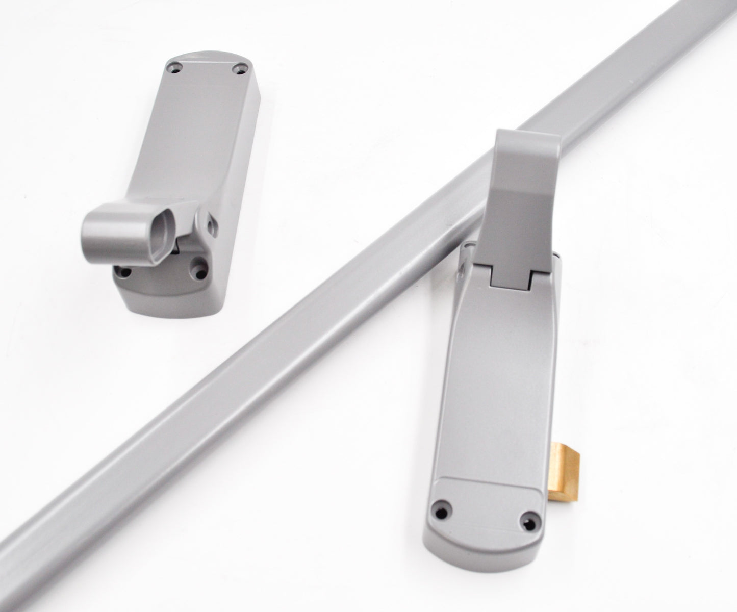 A silver Exidor single panic latch with a push bar, designed for emergency exit applications in buildings. On a white background.