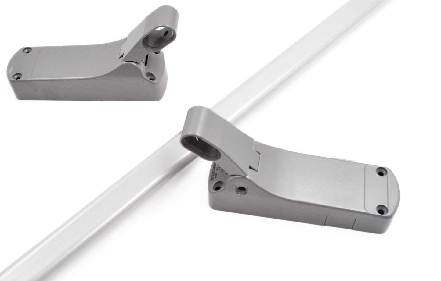 A silver Exidor single panic latch with a push bar, designed for emergency exit applications in buildings. On a white background.