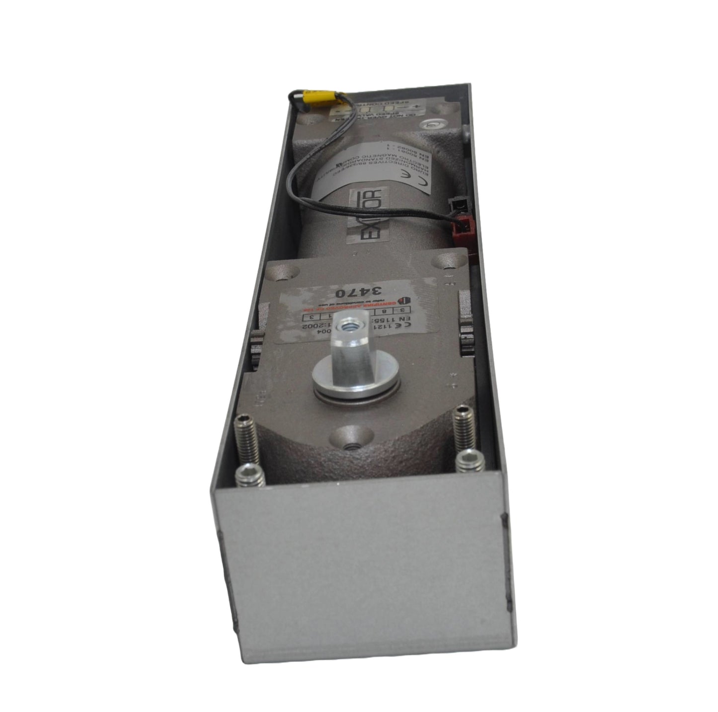 Exidor 3470 EMAG Floor Spring, an electromagnetic hold-open floor closer for heavy-duty doors, showing the mechanism within a metal housing box. On a white background.