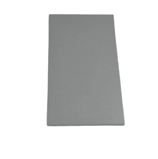A grey galvanised metal blanking plate with a rectangular shape. On a white background