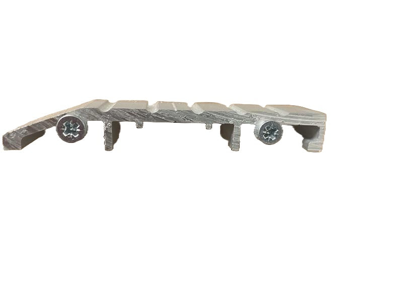 Anodised aluminium threshold plate with a double ramp profile, showing the top edge with a slightly elevated central section. On a white background.