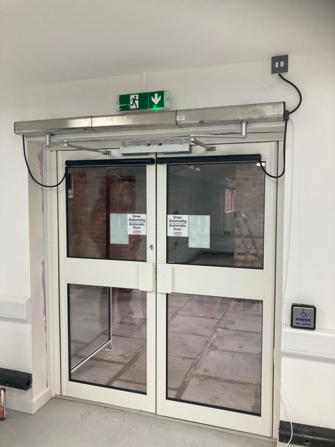 Energy-Efficient Automatic Door Operators for Sustainable UK Buildings (2026 Guide)