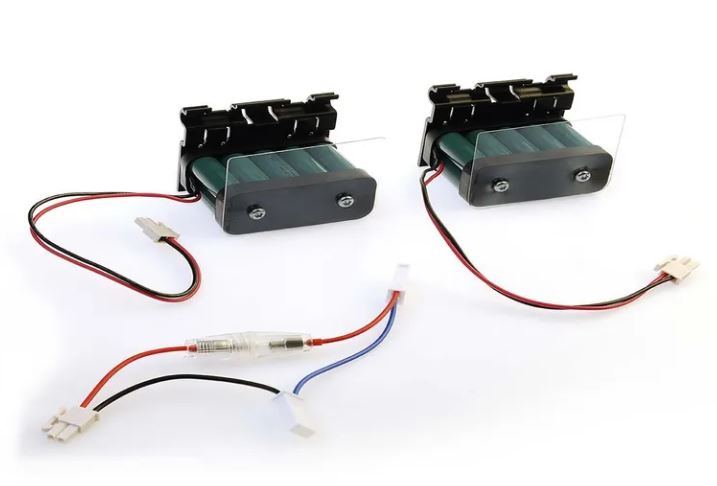 Two battery packs with Blue, Black and Red wires with connectors on a white background