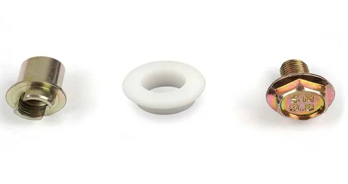 Assa Abloy derailment wheel consisting of  round plastic, a bolt and nut, on a white background.