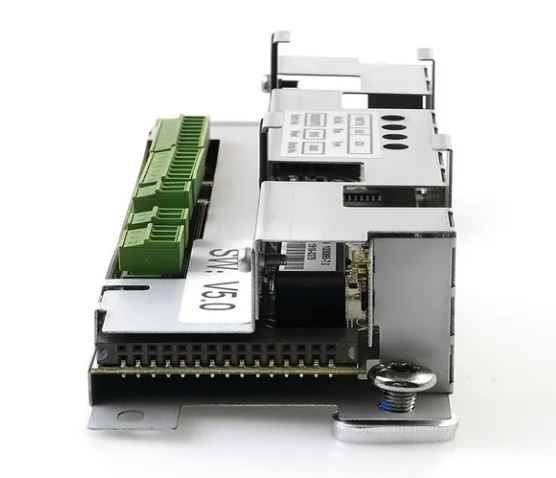 Side view of an Assa Abloy - MUK IO Board Kit consisting of Electronic module with green connectors on a white background.