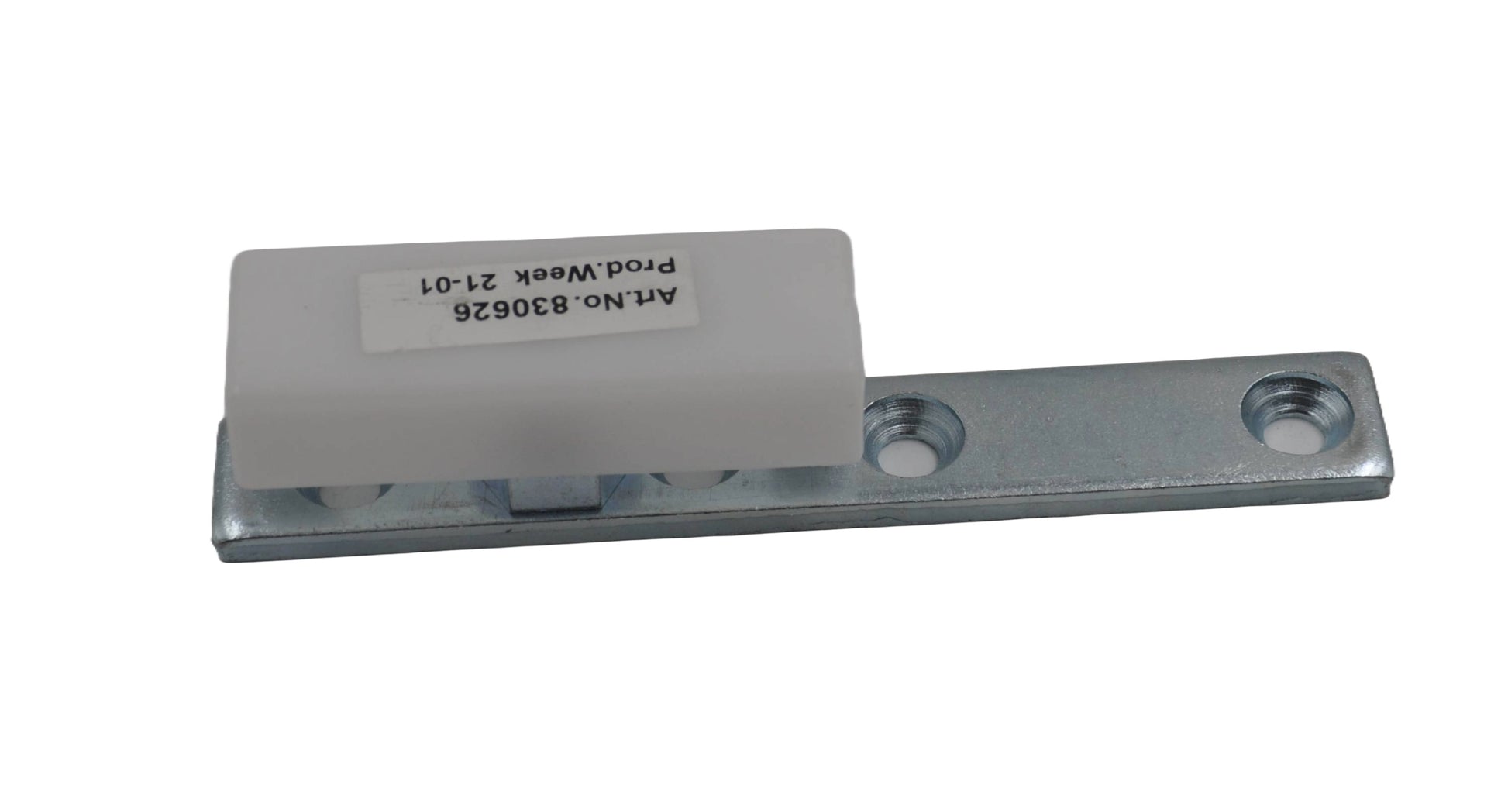 A top view of a  Besam Floor Guide Long Mounting Plate,  a rectangular metal plate with a white plastic rectangle mounted on the top and several holes drilled in,  also showing a white sticker with black print. On a white background.