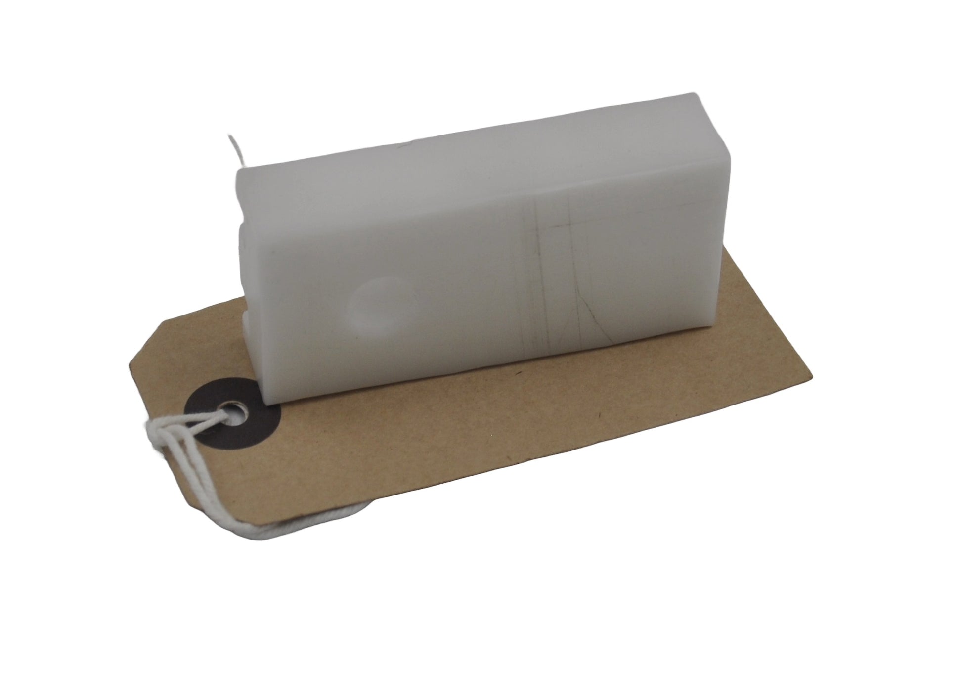 A rear view of a rectangular white piece plastic sat on a brown cardboard tag on a white background.