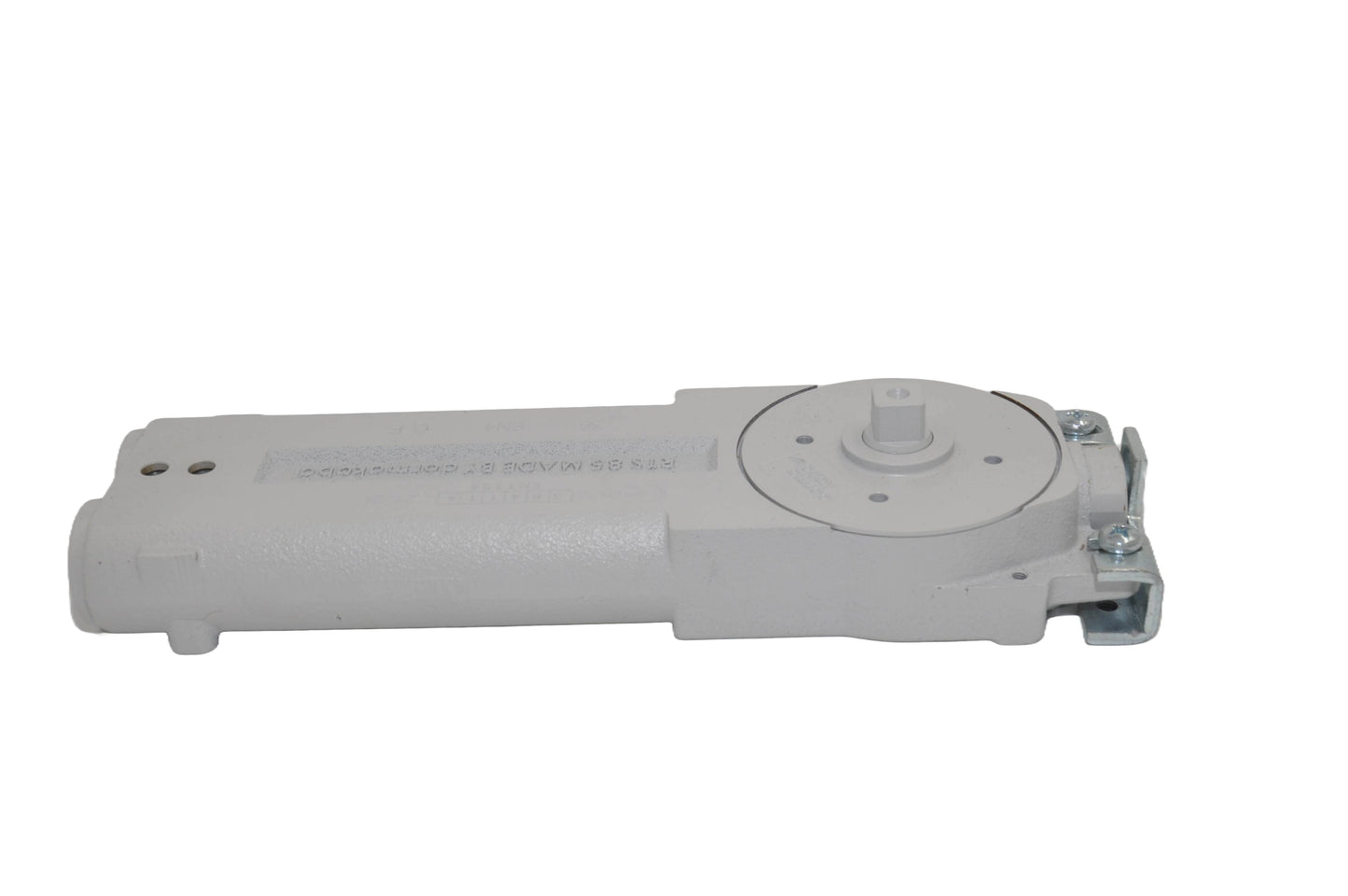 A view of a dormakaba RTS85 Transom Door Closer predominantly grey in colour. On a white background.