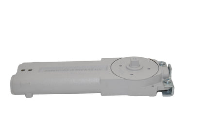 A view of a dormakaba RTS85 Transom Door Closer predominantly grey in colour. On a white background.